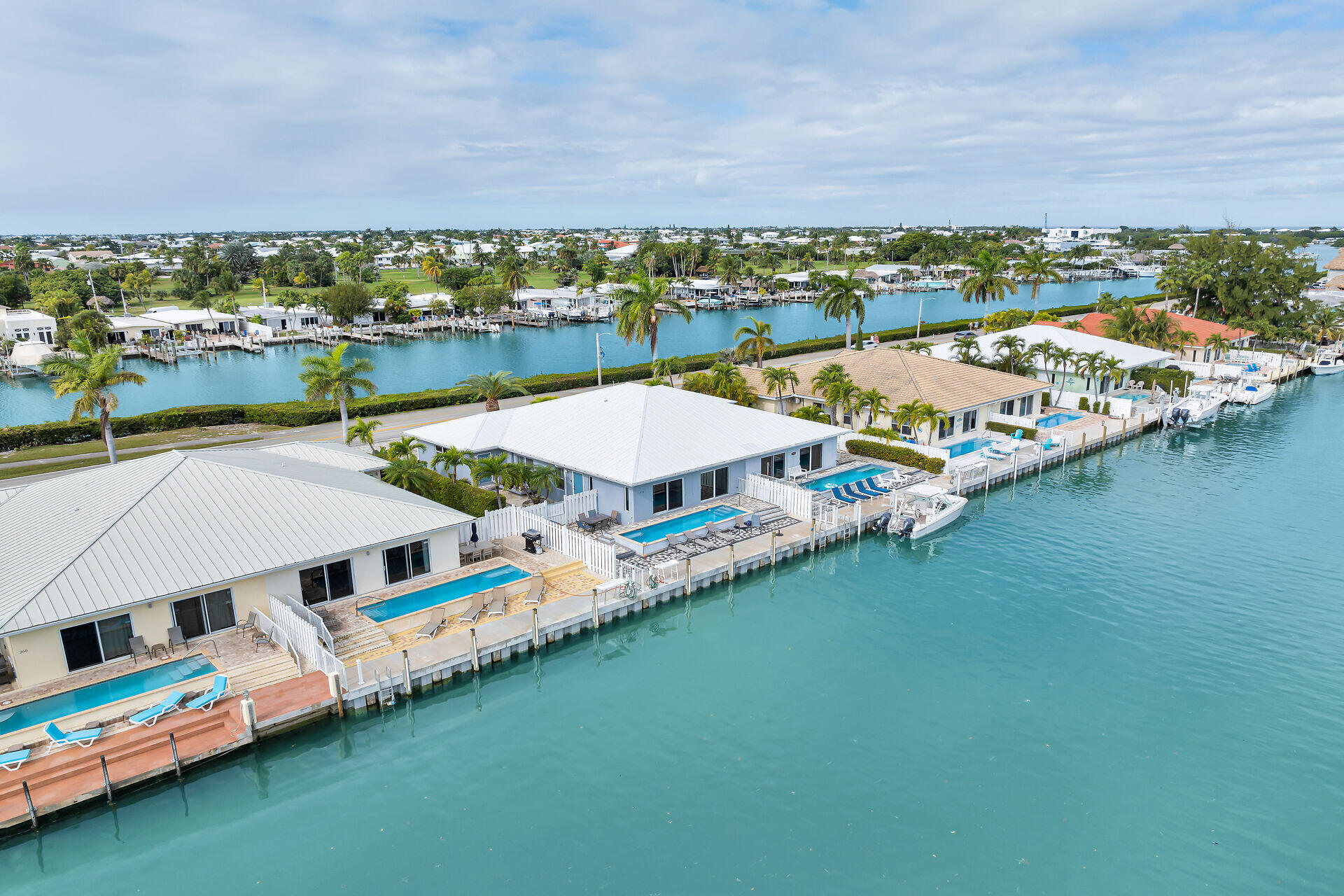 270 Sadowski Key Key Colony Beach, FL 33051 - Photo 4 of 46 a view of a city with lawn chairs