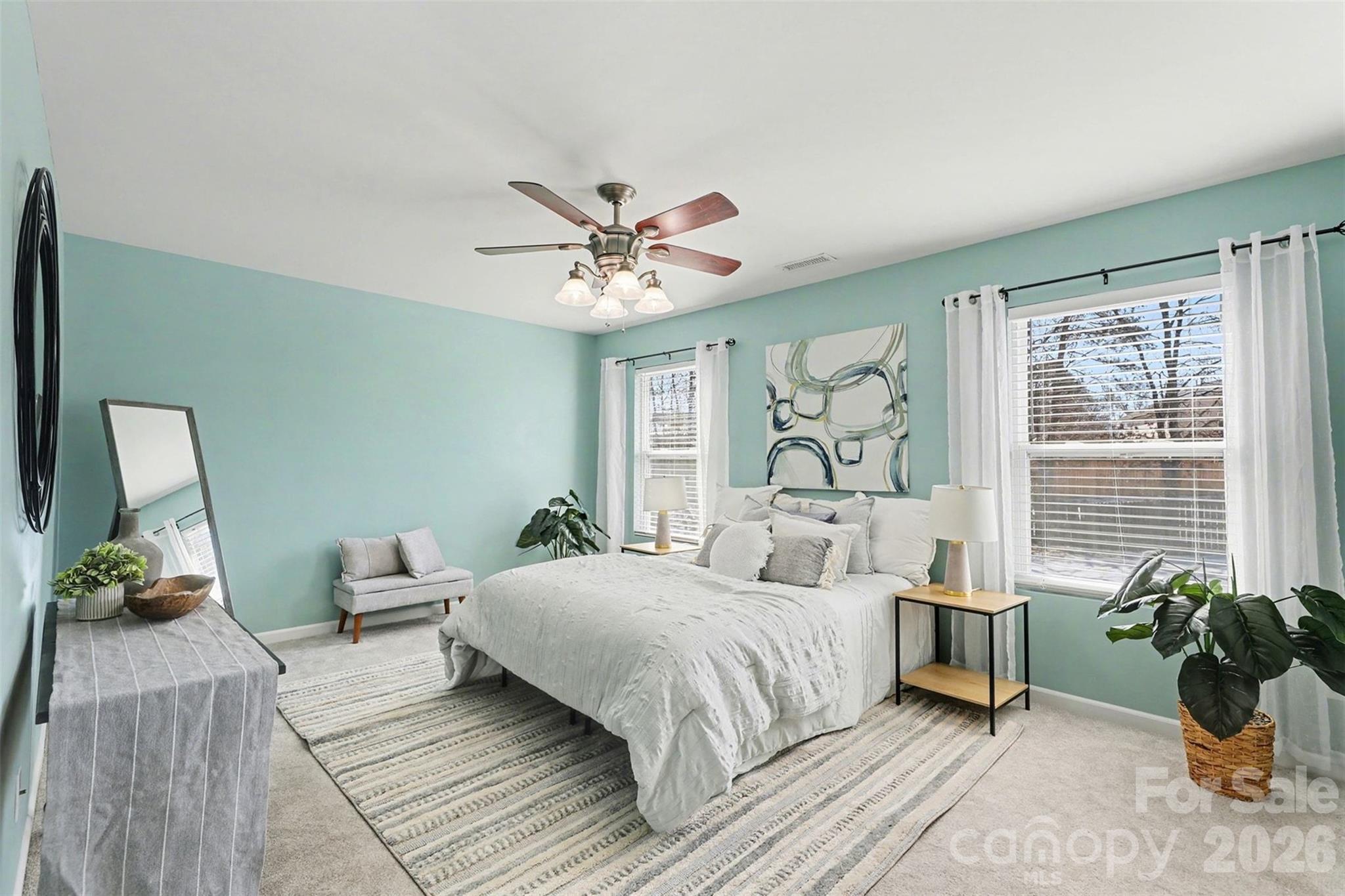 1806 Tradd Avenue Clover, SC 29710 - Photo 14 of 30 a bedroom with a bed and a chandelier
