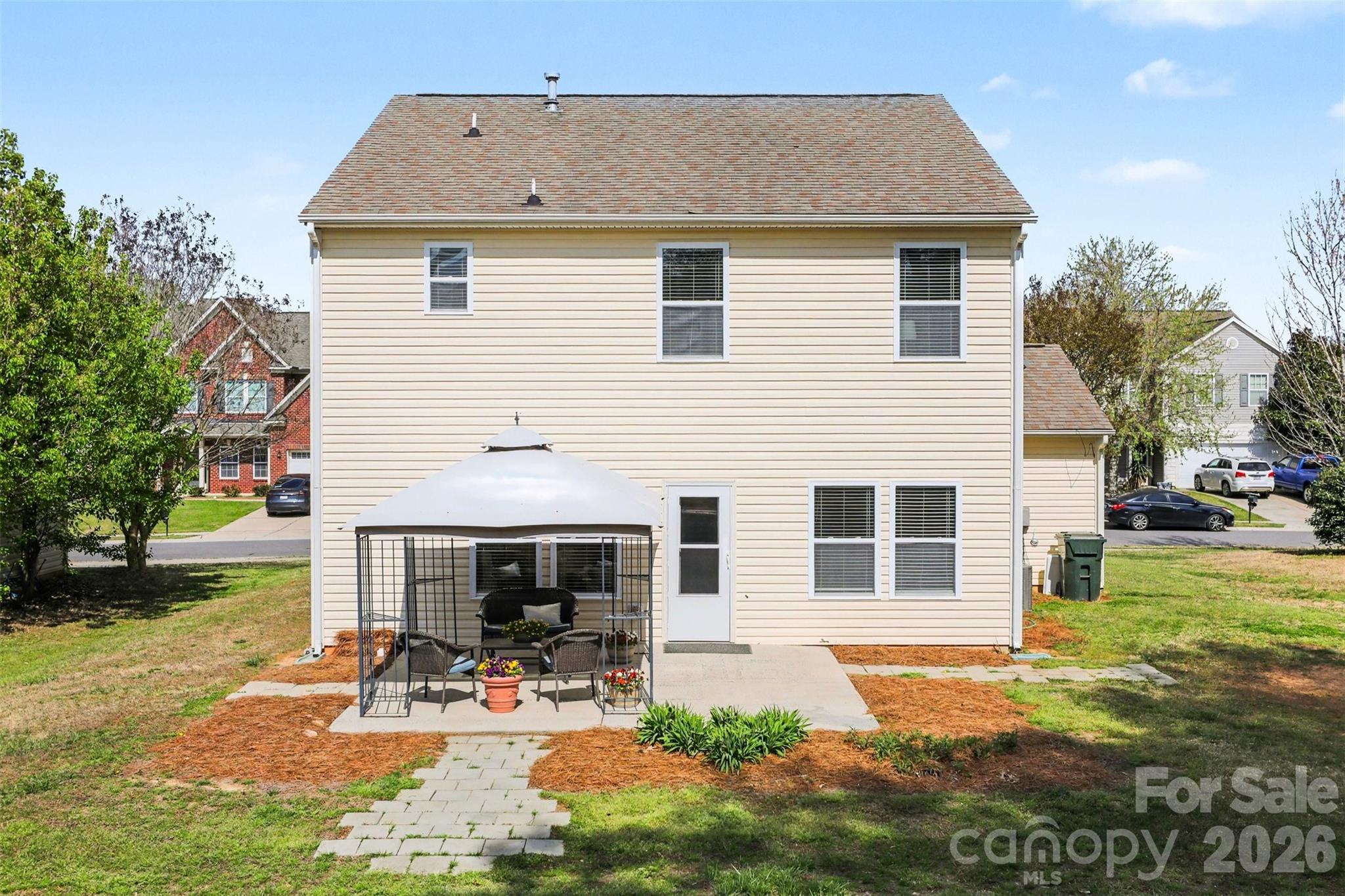 1806 Tradd Avenue Clover, SC 29710 - Photo 28 of 30 a front view of house with yard and trees in the background