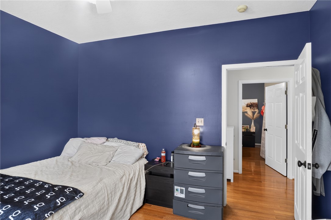 144 Elliott Circle Anderson, SC 29621 - Photo 20 of 30 Hardwood floors and a welcoming doorway create a cozy and inviting bedroom retreat.