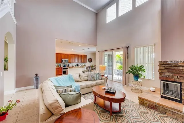 a living room with furniture and a rug