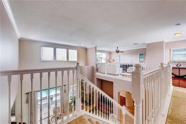 a view of a kitchen with furniture and windows