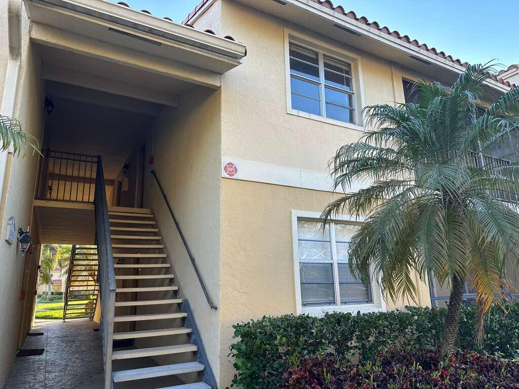 1239 Southwest 46th Avenue, Unit 906 Pompano Beach, FL 33069 - Photo 16 of 23 a view of entryway and hall