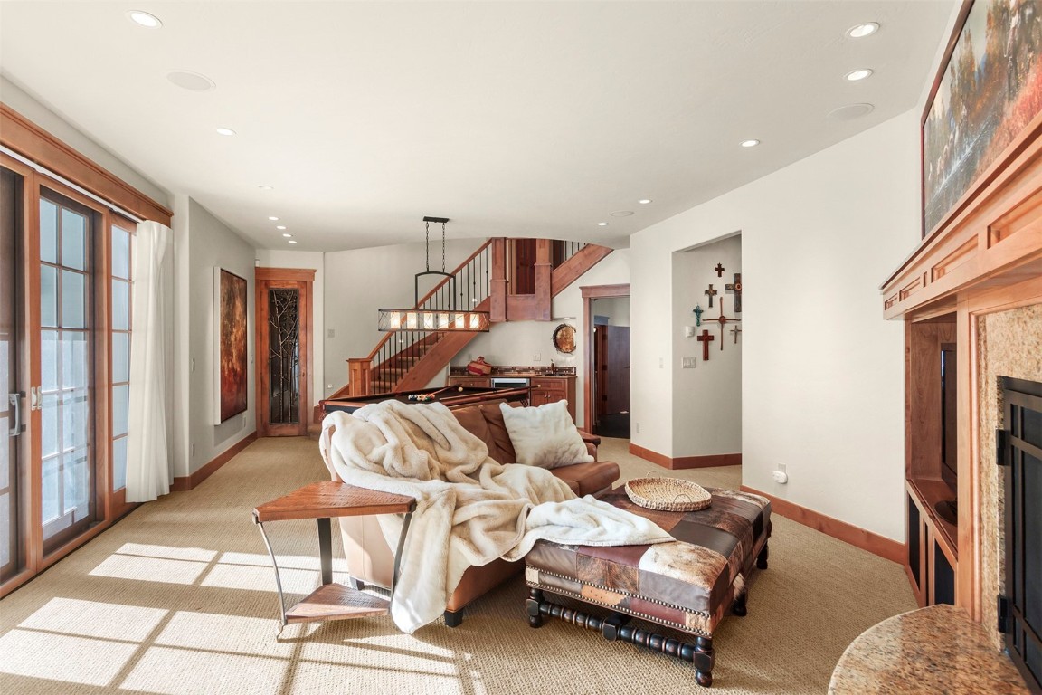 780 Penstemon Road Keystone, CO 80435 - Photo 20 of 40 a bedroom with furniture and wooden floor