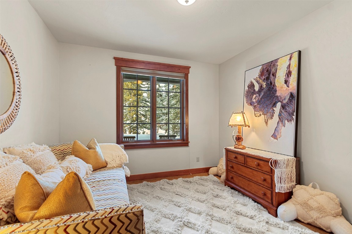 780 Penstemon Road Keystone, CO 80435 - Photo 25 of 40 a bedroom with a bed and a window