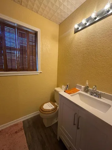 a bathroom with a sink and a toilet