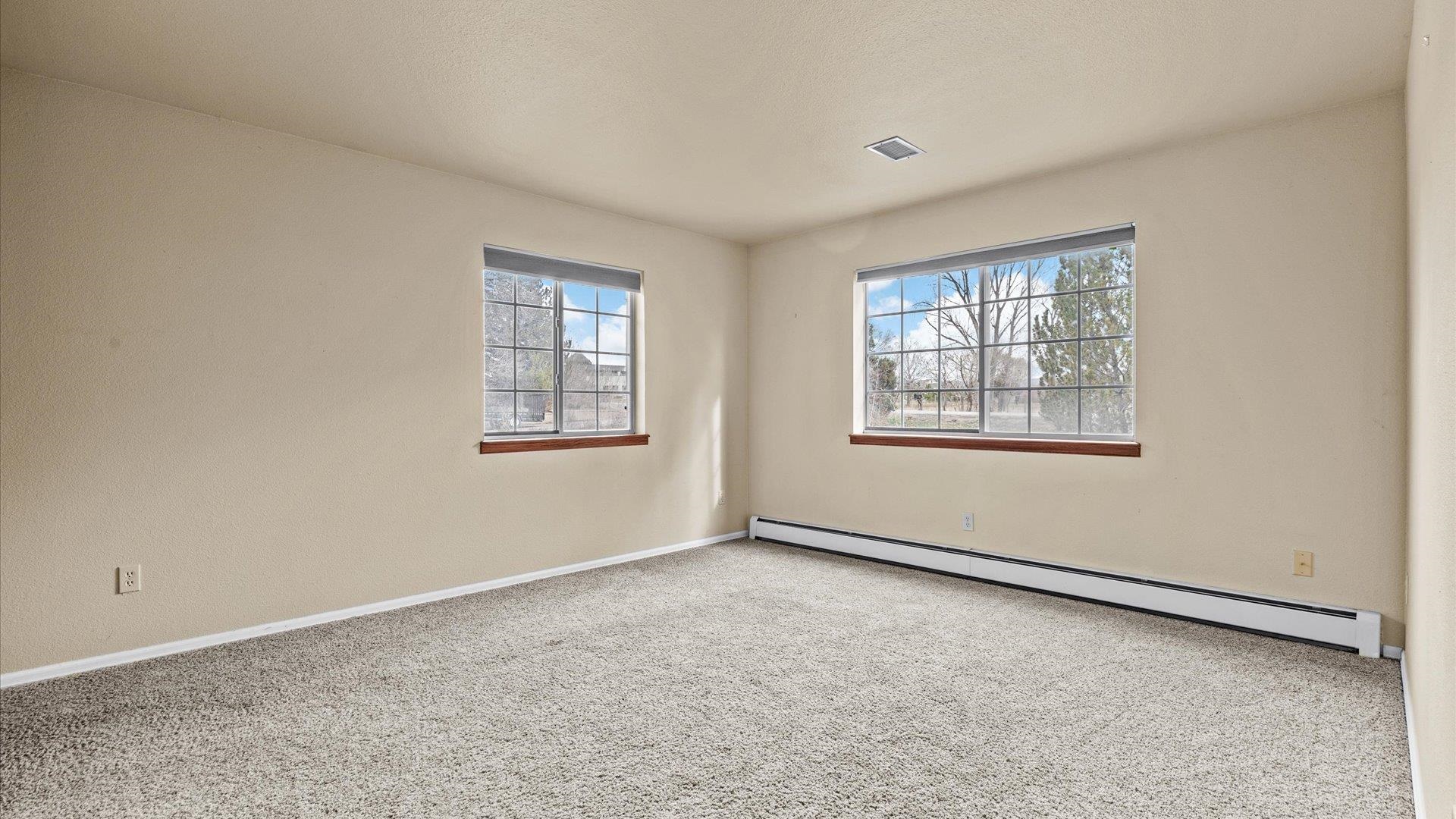 1195-17 1/2 North 1/2 Road Fruita, CO 81521 - Photo 19 of 33 an empty room with windows