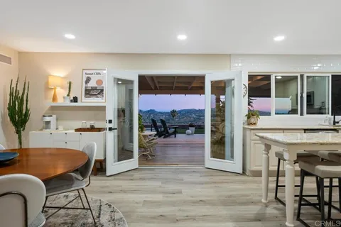 a bed room with a bed and a chandelier