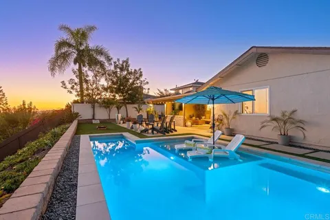 a view of a chairs and table in the terrace