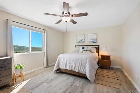 a bathroom with a toilet and a tub