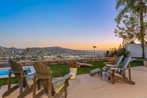 a view of a city with a lake