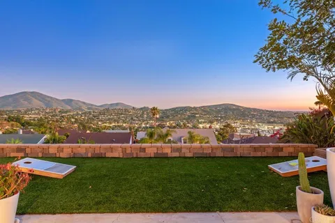 a view of a chairs and table in the terrace