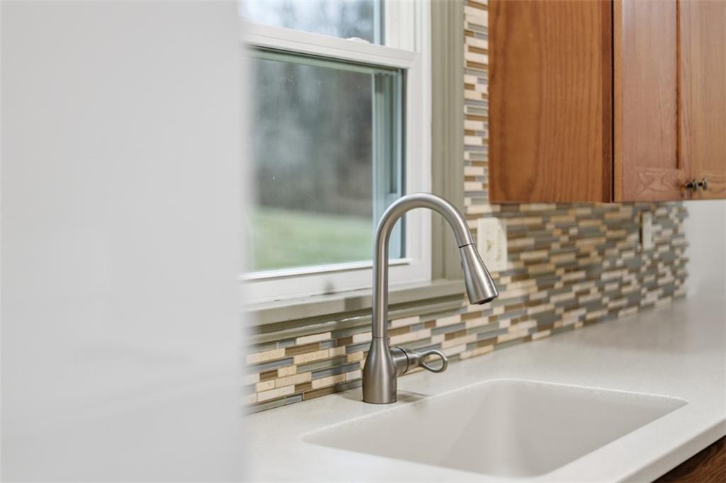 123 Wampum Road Wampum, PA 16157 - Photo 6 of 33 a bathroom with a sink and a mirror