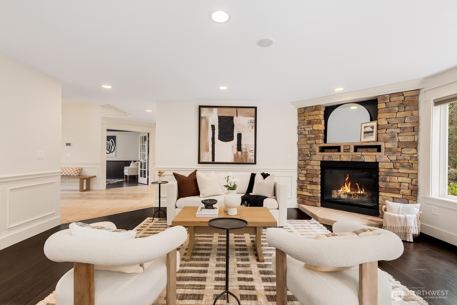 4826 196th Street Southeast Bothell, WA 98012 - Photo 12 of 40 a living room with furniture a fireplace and a potted plant