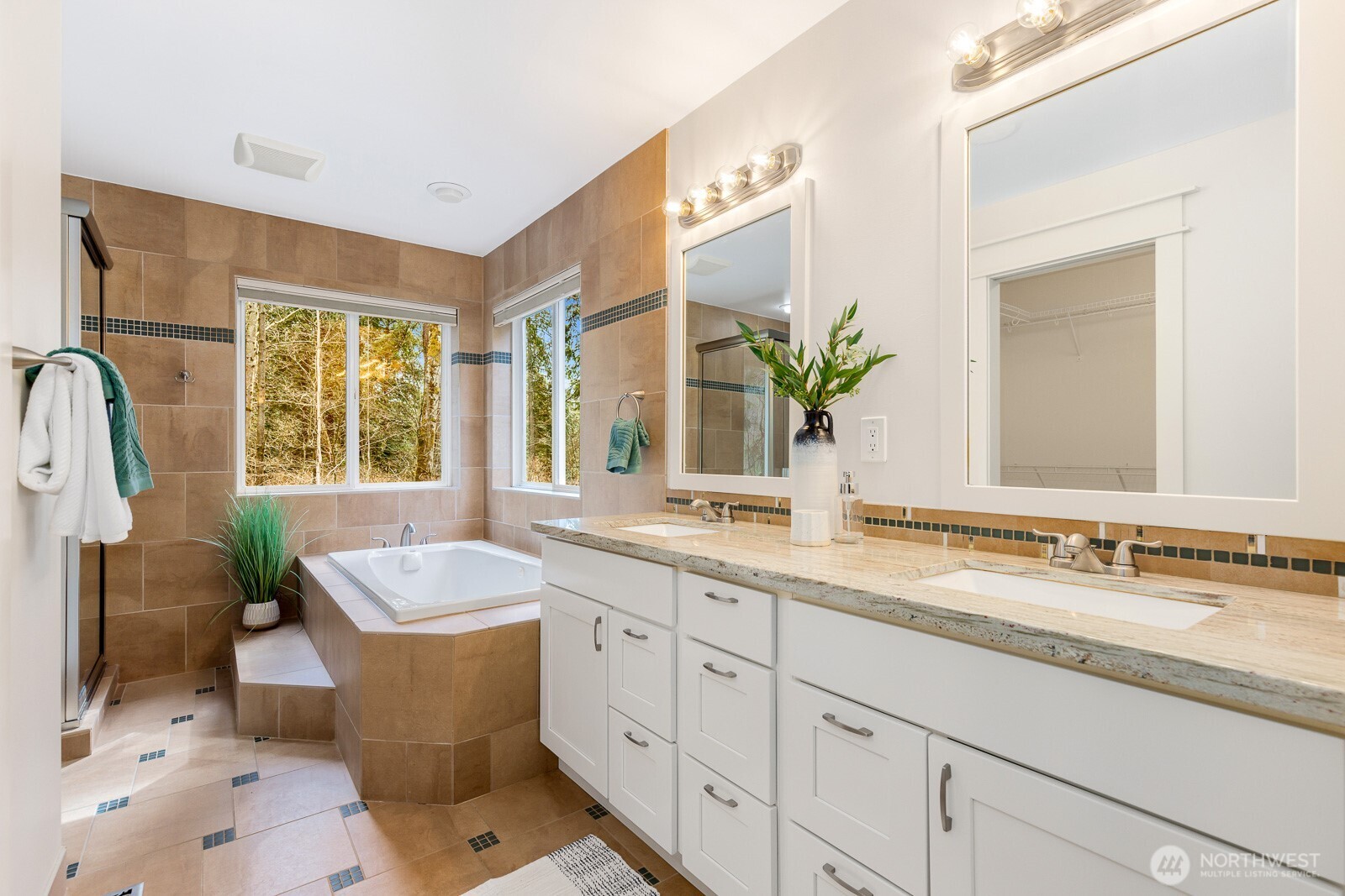 4826 196th Street Southeast Bothell, WA 98012 - Photo 16 of 40 a bath room with a sink and a mirror