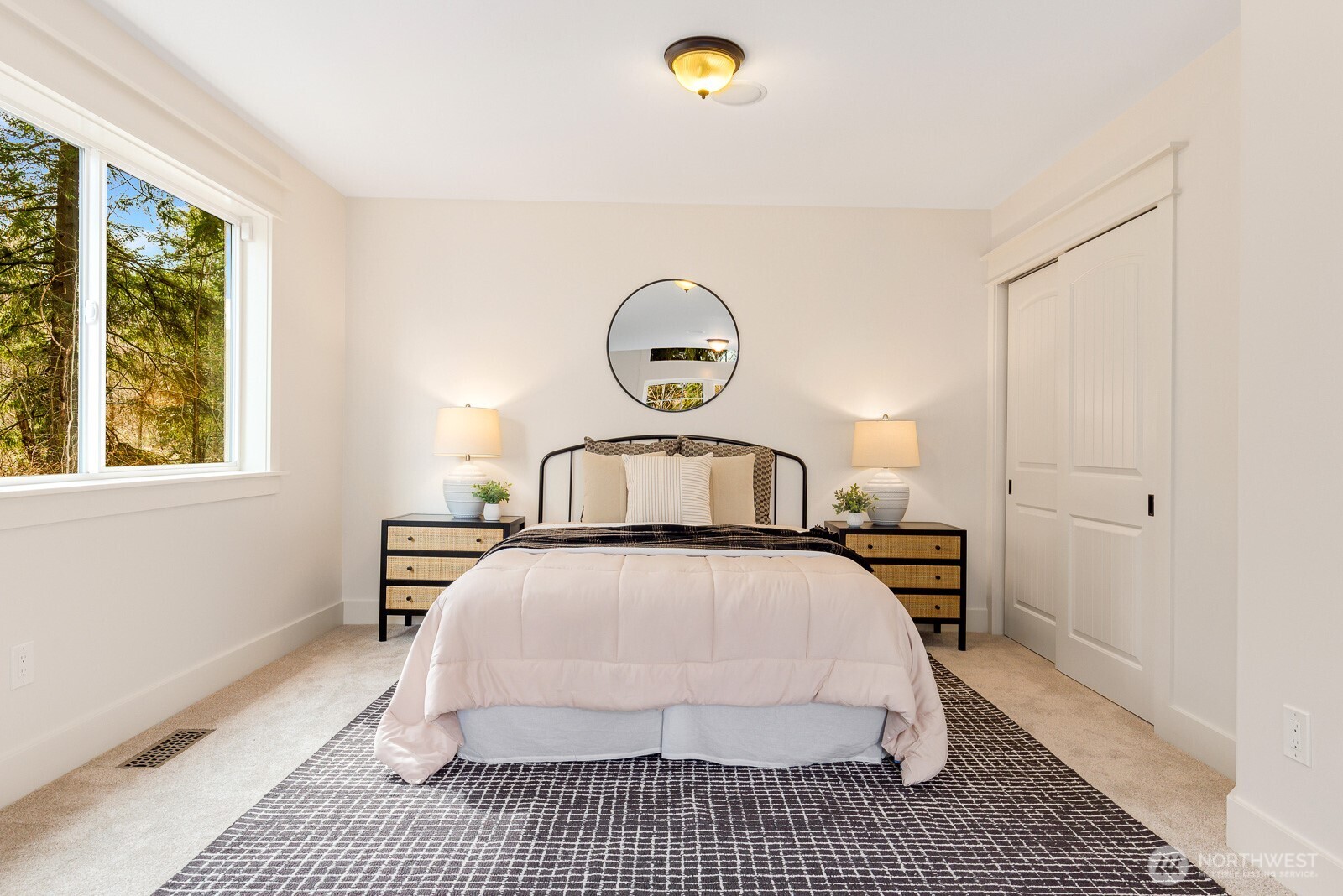 4826 196th Street Southeast Bothell, WA 98012 - Photo 17 of 40 a bedroom with a bed and a window