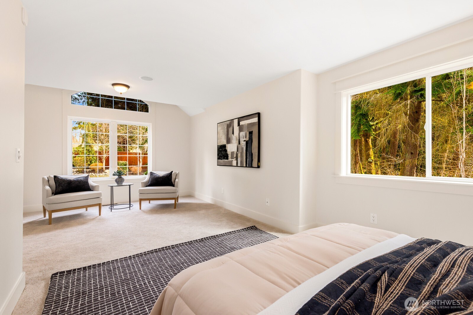 4826 196th Street Southeast Bothell, WA 98012 - Photo 18 of 40 a bedroom with a bed and wooden floor