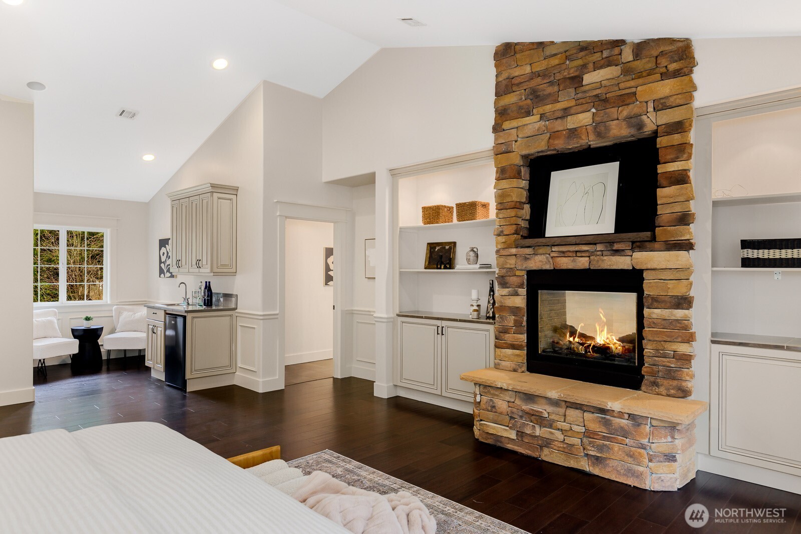 4826 196th Street Southeast Bothell, WA 98012 - Photo 23 of 40 a living room with furniture and a fireplace