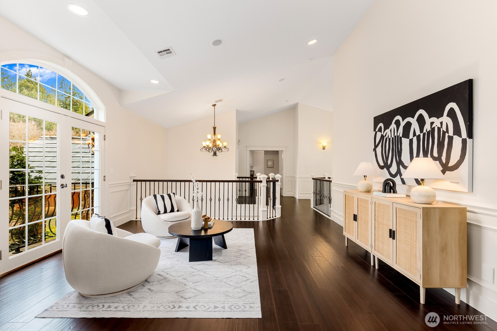 4826 196th Street Southeast Bothell, WA 98012 - Photo 25 of 40 a living room with furniture and wooden floor