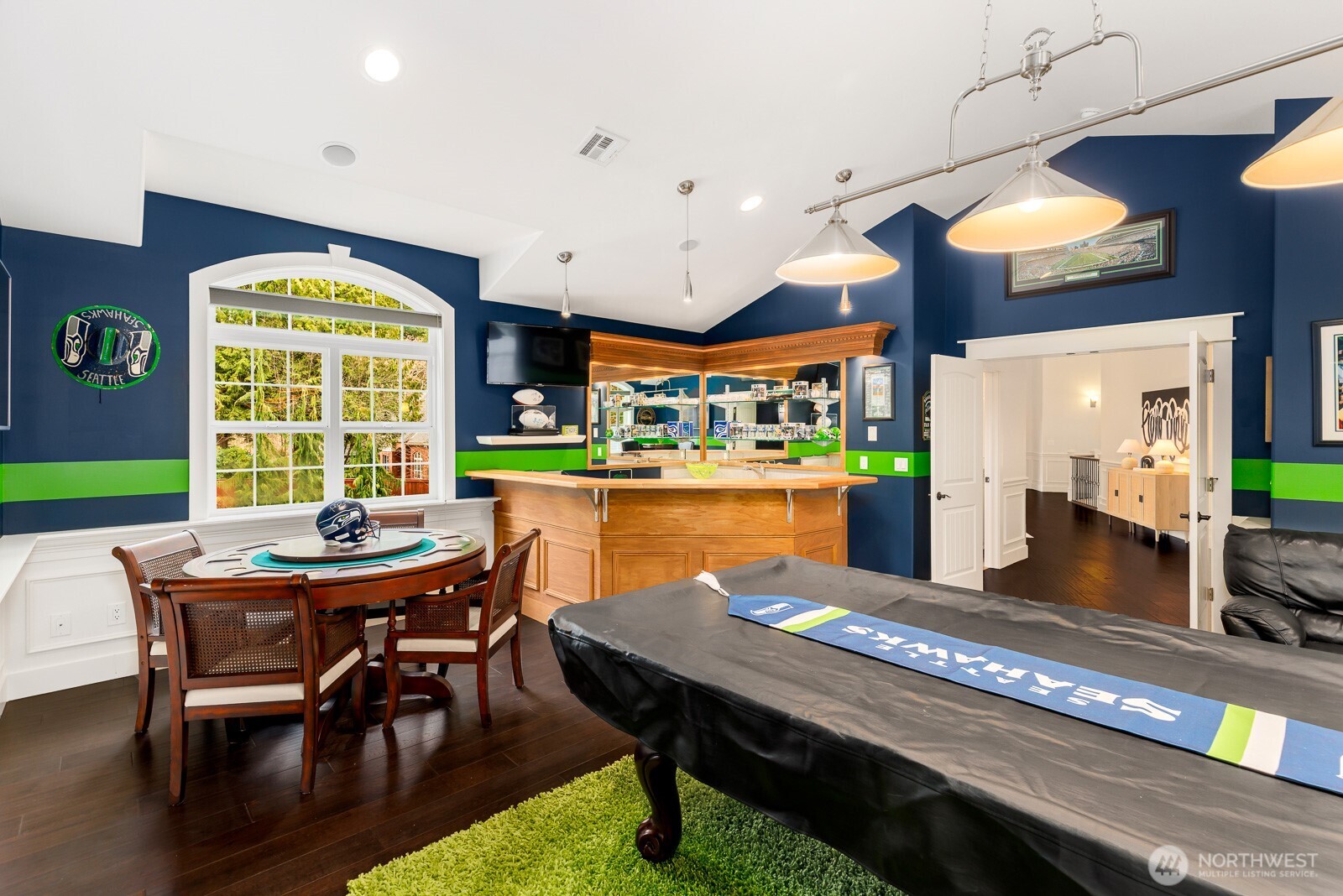 4826 196th Street Southeast Bothell, WA 98012 - Photo 30 of 40 a view of a dining room with furniture window and wooden floor
