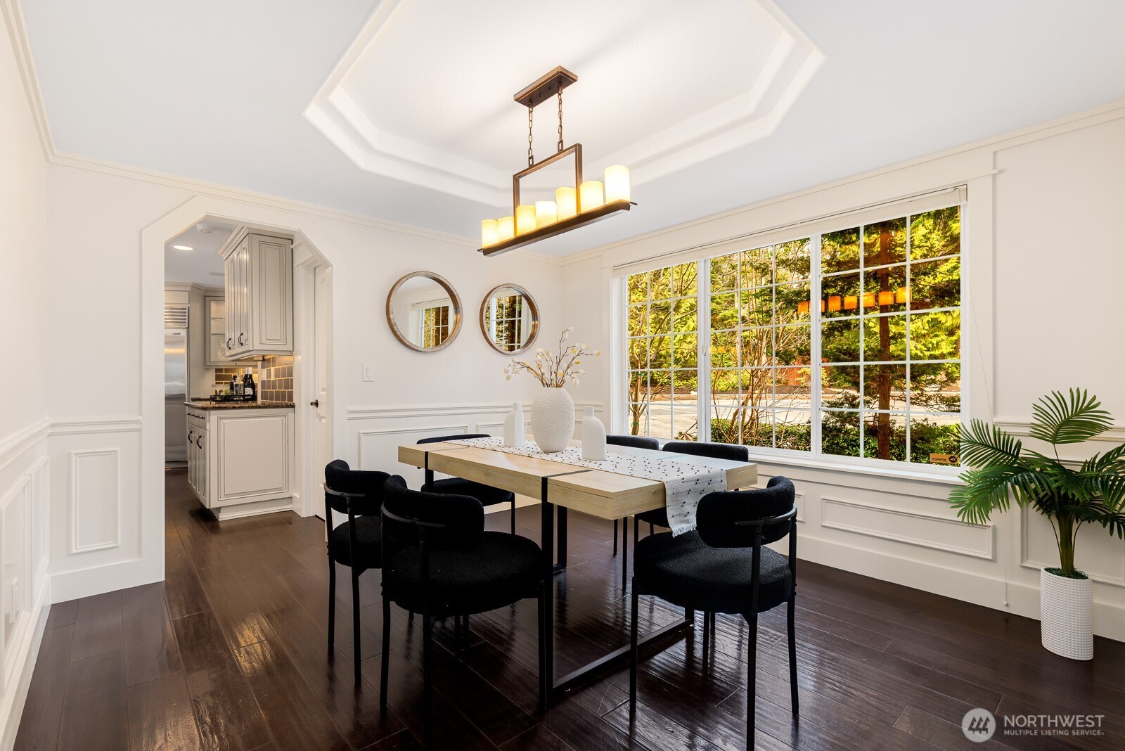 4826 196th Street Southeast Bothell, WA 98012 - Photo 6 of 40 a view of a dining room with furniture window and wooden floor
