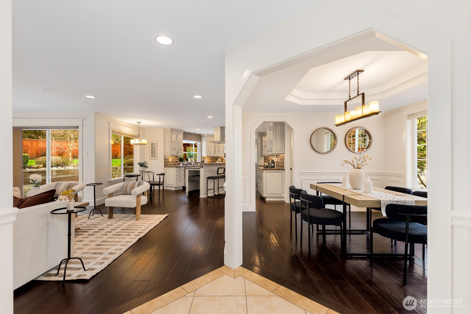 4826 196th Street Southeast Bothell, WA 98012 - Photo 7 of 40 an open kitchen with dining table and chairs