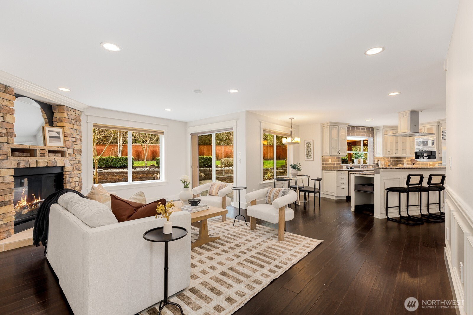 4826 196th Street Southeast Bothell, WA 98012 - Photo 8 of 40 a living room with fireplace furniture and a large window