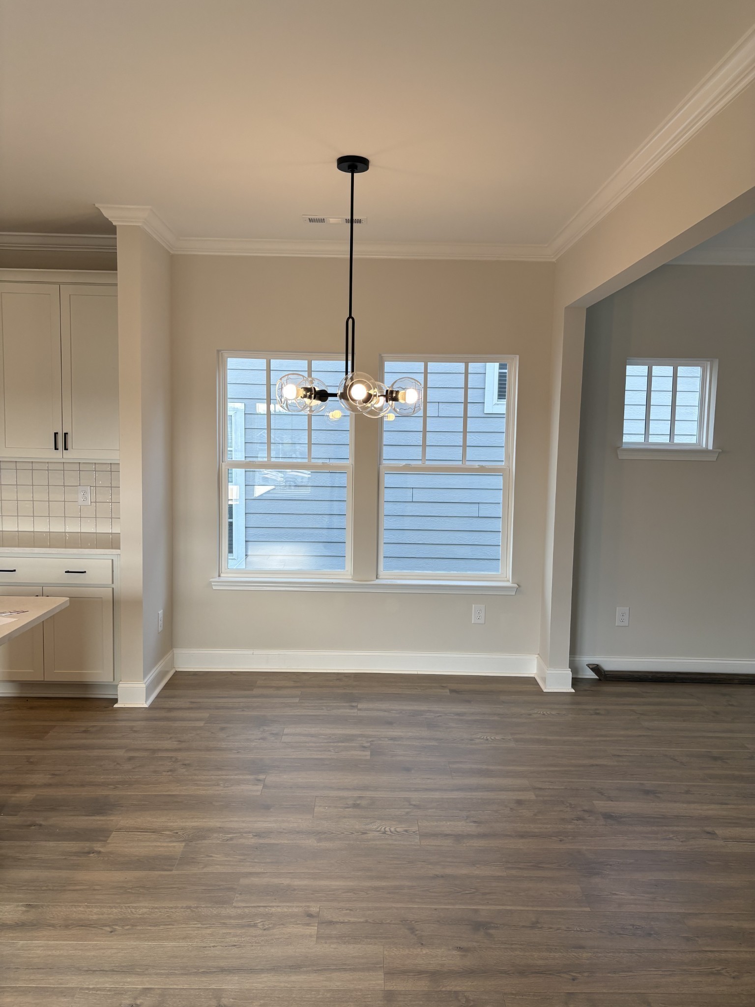 7355 Carothers Road La Vergne, TN 37086 - Photo 8 of 44 a view of empty room with wooden floor and window