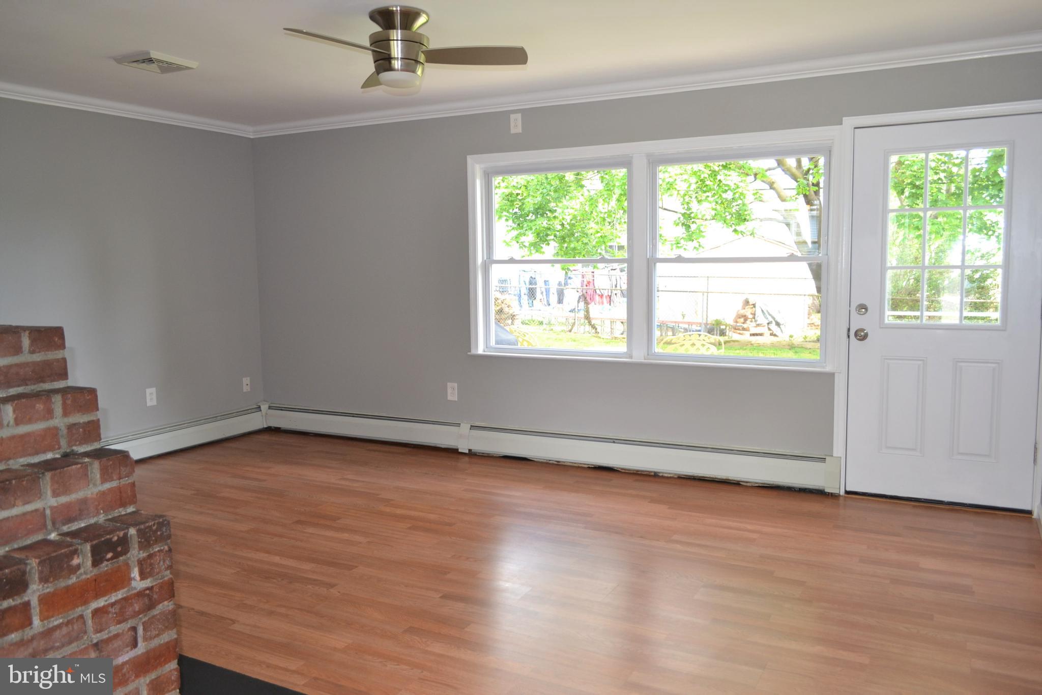 78 Border Rock Road Levittown, PA 19057 - Photo 4 of 6 Living room; door to back yard