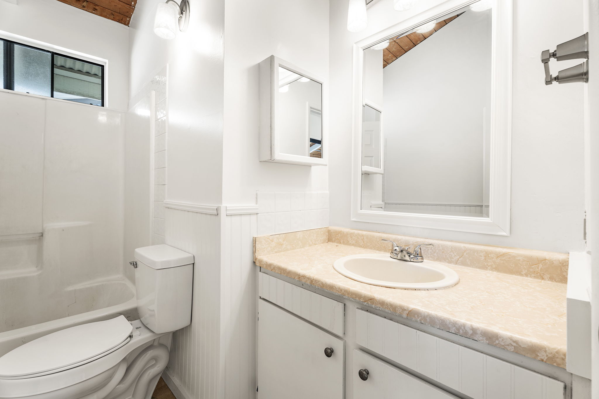 77-6650 Walua Road Kailua-Kona, HI 96740 - Photo 29 of 29 a bathroom with a sink toilet vanity and shower