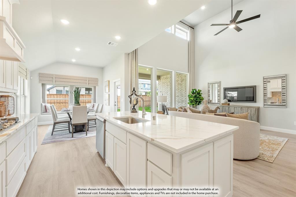 1141 Hitching Post Way Oak Point, TX 75068 - Photo 12 of 39 a large white kitchen with sink and cabinets