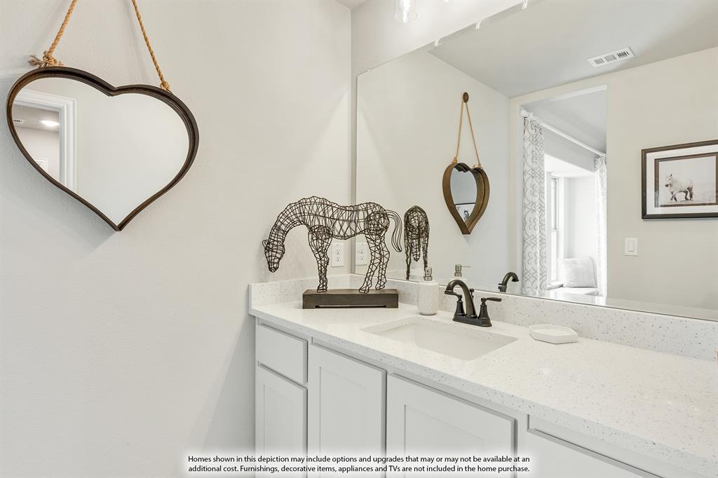 1141 Hitching Post Way Oak Point, TX 75068 - Photo 37 of 39 a bathroom with a sink and a mirror