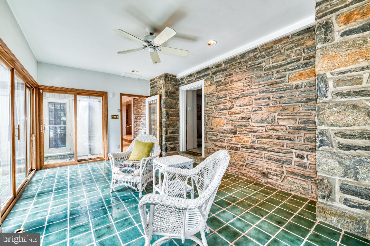 124 Cornwall Lane Wayne, PA 19087 - Photo 17 of 47 Sun room stone wall