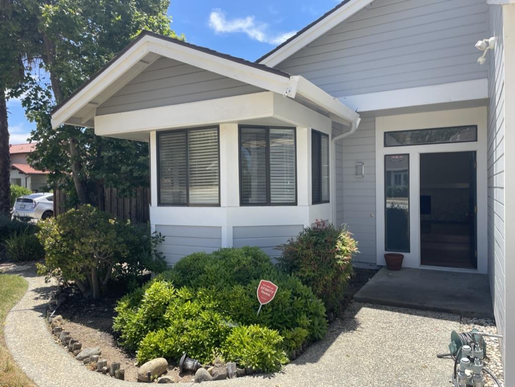 3550 Slopeview Drive San Jose, CA 95148 - Photo 2 of 7 a front view of a house with garden