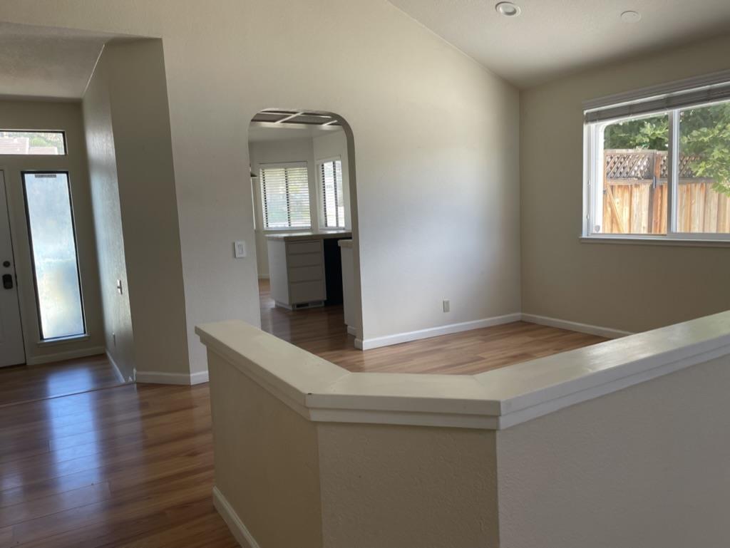 3550 Slopeview Drive San Jose, CA 95148 - Photo 4 of 7 an entryway with wooden floor and windows