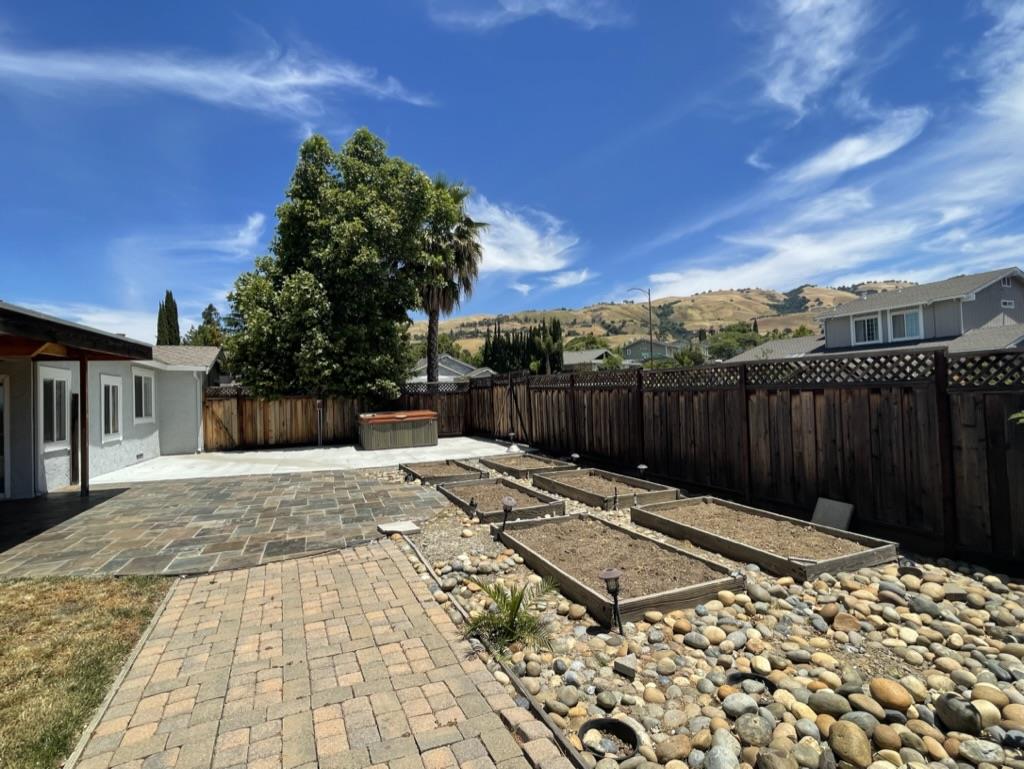 3550 Slopeview Drive San Jose, CA 95148 - Photo 6 of 7 a view of a backyard