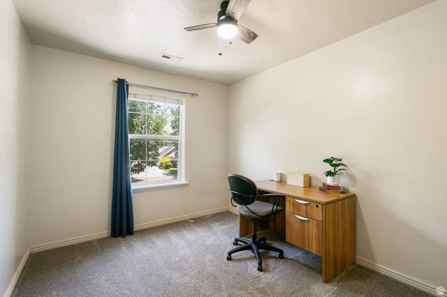 1393 West 150 North Springville, UT 84663 - Photo 15 of 31 Room featuring neutral wall tones, gray carpeting, and a window with white trim