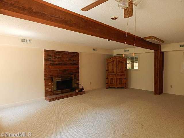 618 Pepperidge Road Lewisville, NC 27023 - Photo 11 of 16 Den/Family/Great Room. Huge den/family/great room finished in basement. Recent carpet.