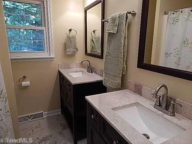618 Pepperidge Road Lewisville, NC 27023 - Photo 10 of 16 Master Bath/Spa. New vanities in master bath.