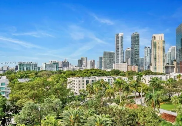 a view of a city with tall buildings in the background