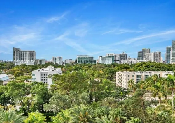a view of a city with tall buildings