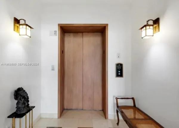 a view of a hallway with closet