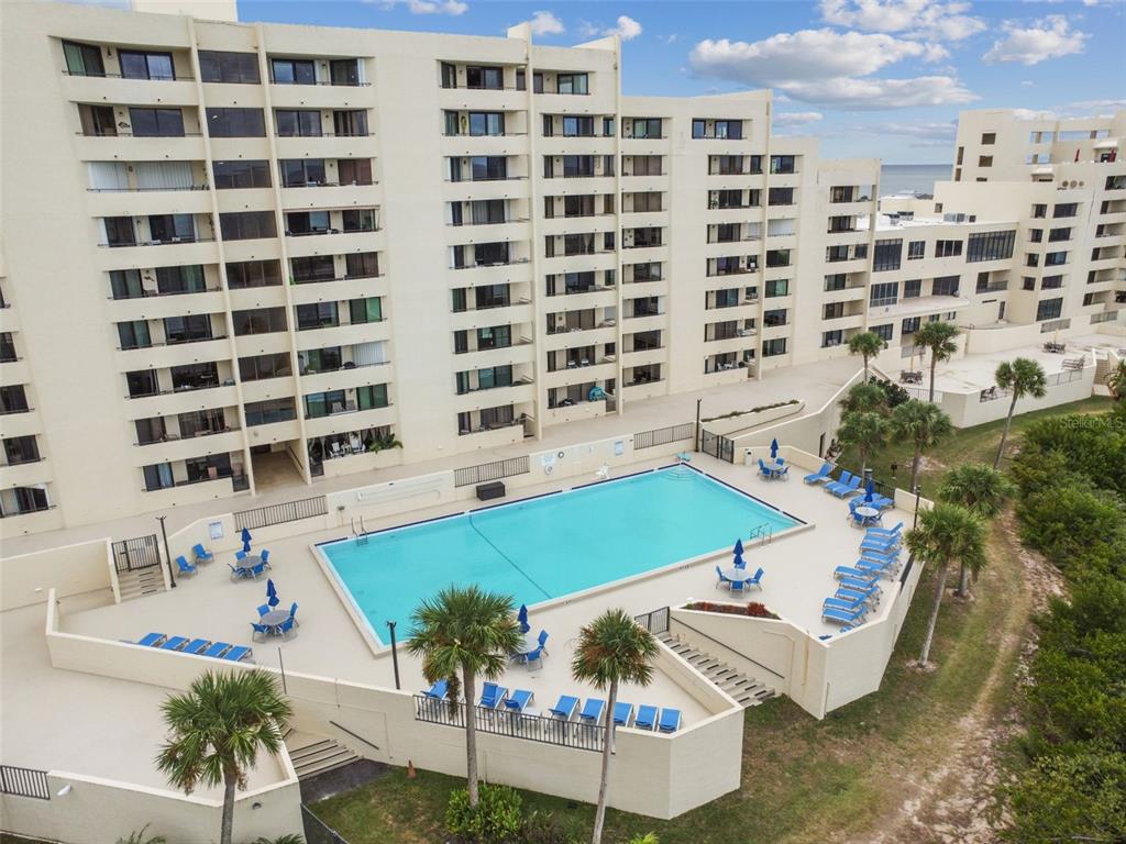 5915 Sea Ranch Drive, Unit 308 Hudson, FL 34667 - Photo 40 of 64 a picture of a building with a outdoor space