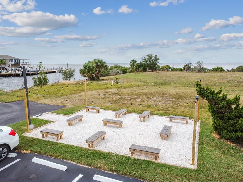 5915 Sea Ranch Drive, Unit 308 Hudson, FL 34667 - Photo 43 of 64 a view of a lake with couches and city view