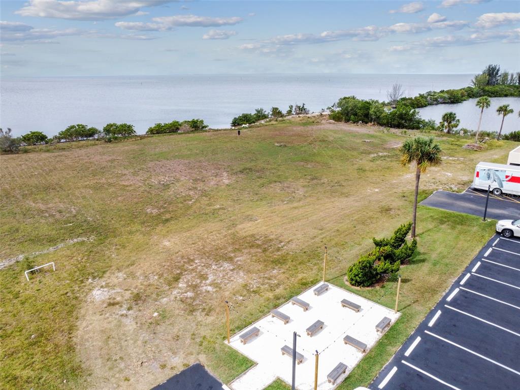 5915 Sea Ranch Drive, Unit 308 Hudson, FL 34667 - Photo 44 of 64 a view of a lake with a mountain view