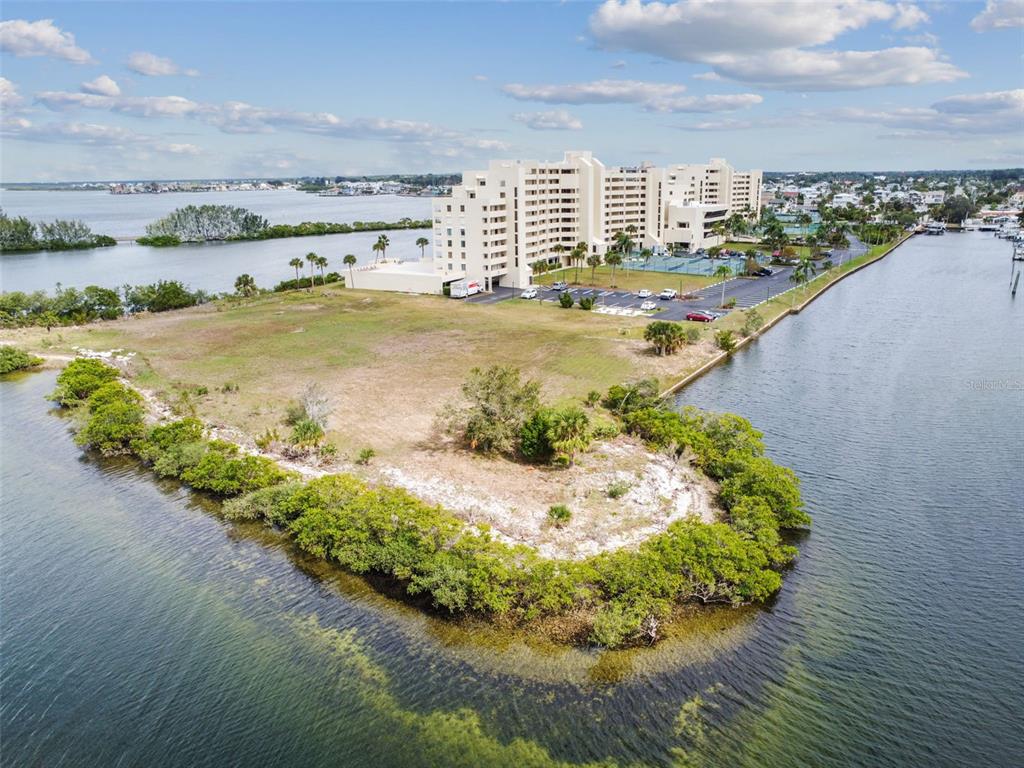 5915 Sea Ranch Drive, Unit 308 Hudson, FL 34667 - Photo 46 of 64 a view of a lake with a city