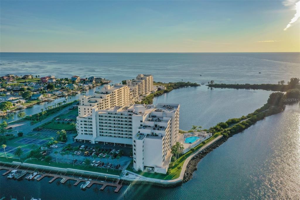 5915 Sea Ranch Drive, Unit 308 Hudson, FL 34667 - Photo 50 of 64 an aerial view of a city and lake view