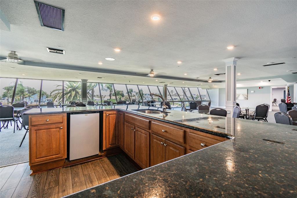5915 Sea Ranch Drive, Unit 308 Hudson, FL 34667 - Photo 51 of 64 a very nice looking kitchen with a large window