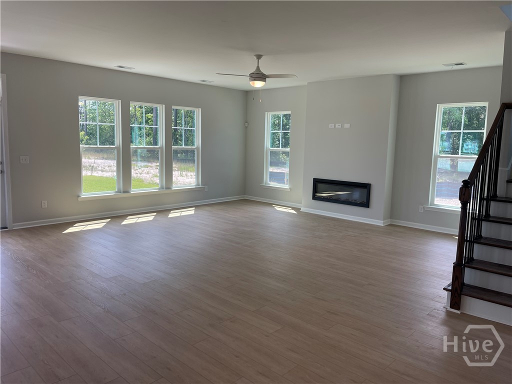 193 Champlain Drive Pooler, GA 31322 - Photo 6 of 19 Family Room with tons of Windows