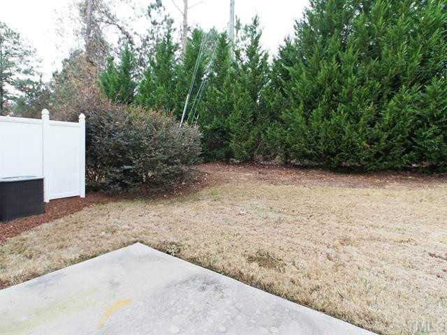 7112 Racine Way Raleigh, NC 27615 - Photo 23 of 25 a view of backyard with green space